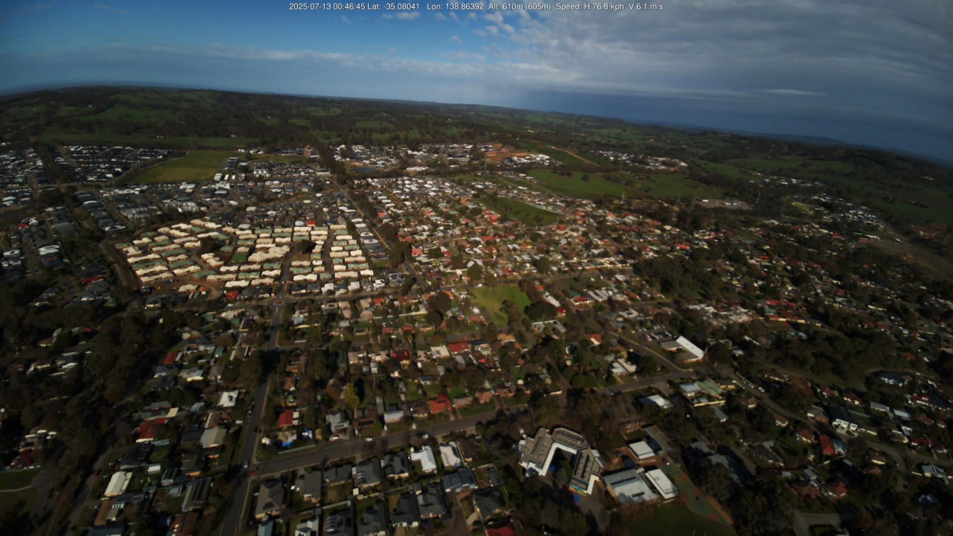 A picture from the payload pointing down at Mt Barker. Many buildings visible