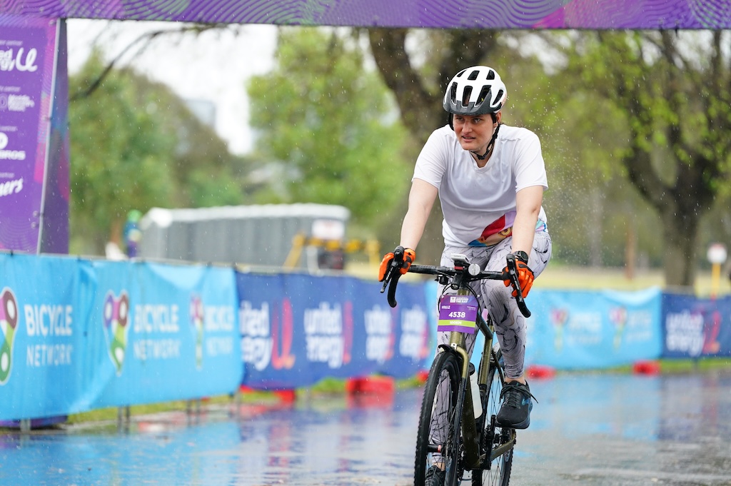 Riding through one of the finish archways