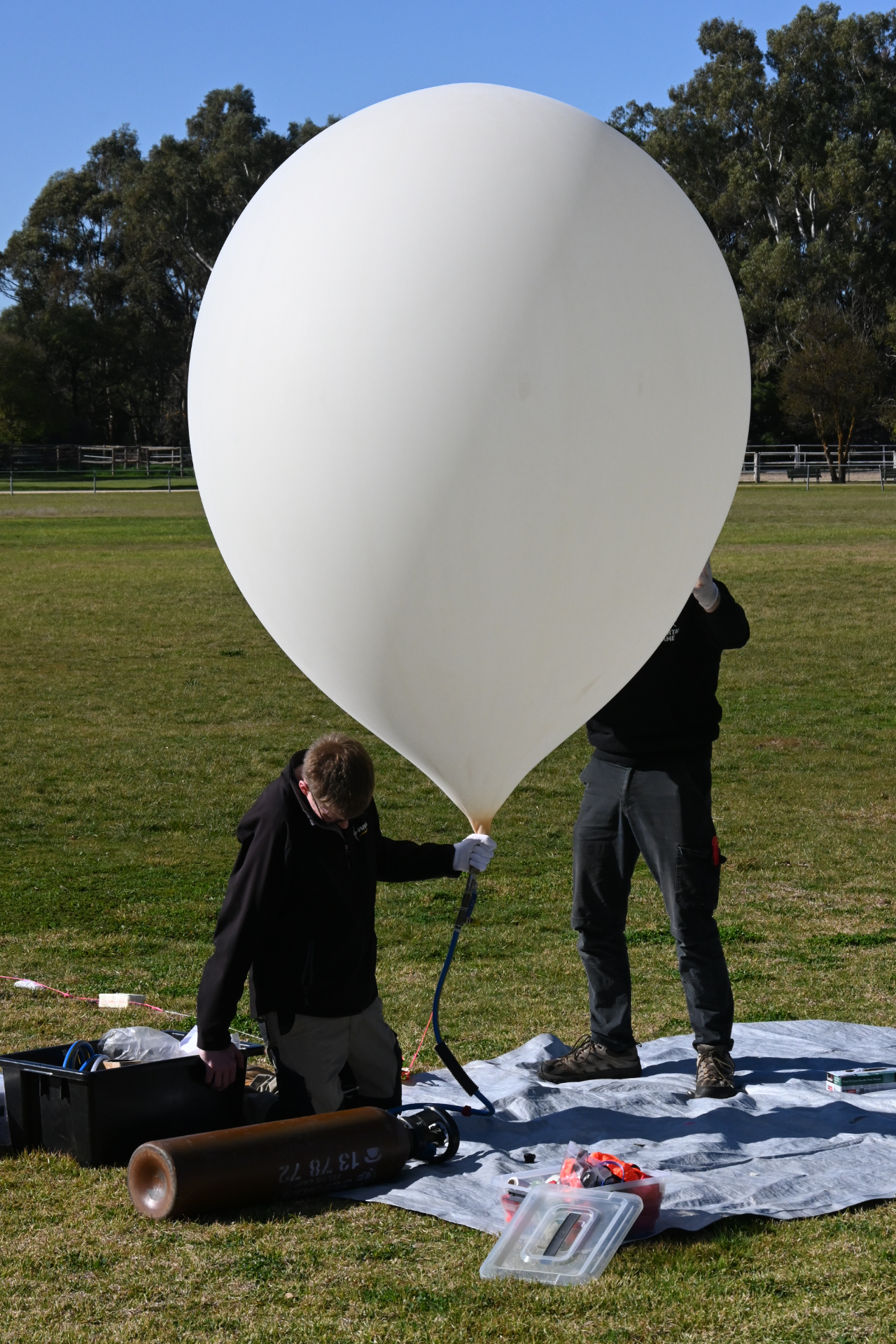 An amateur weather balloon being filled