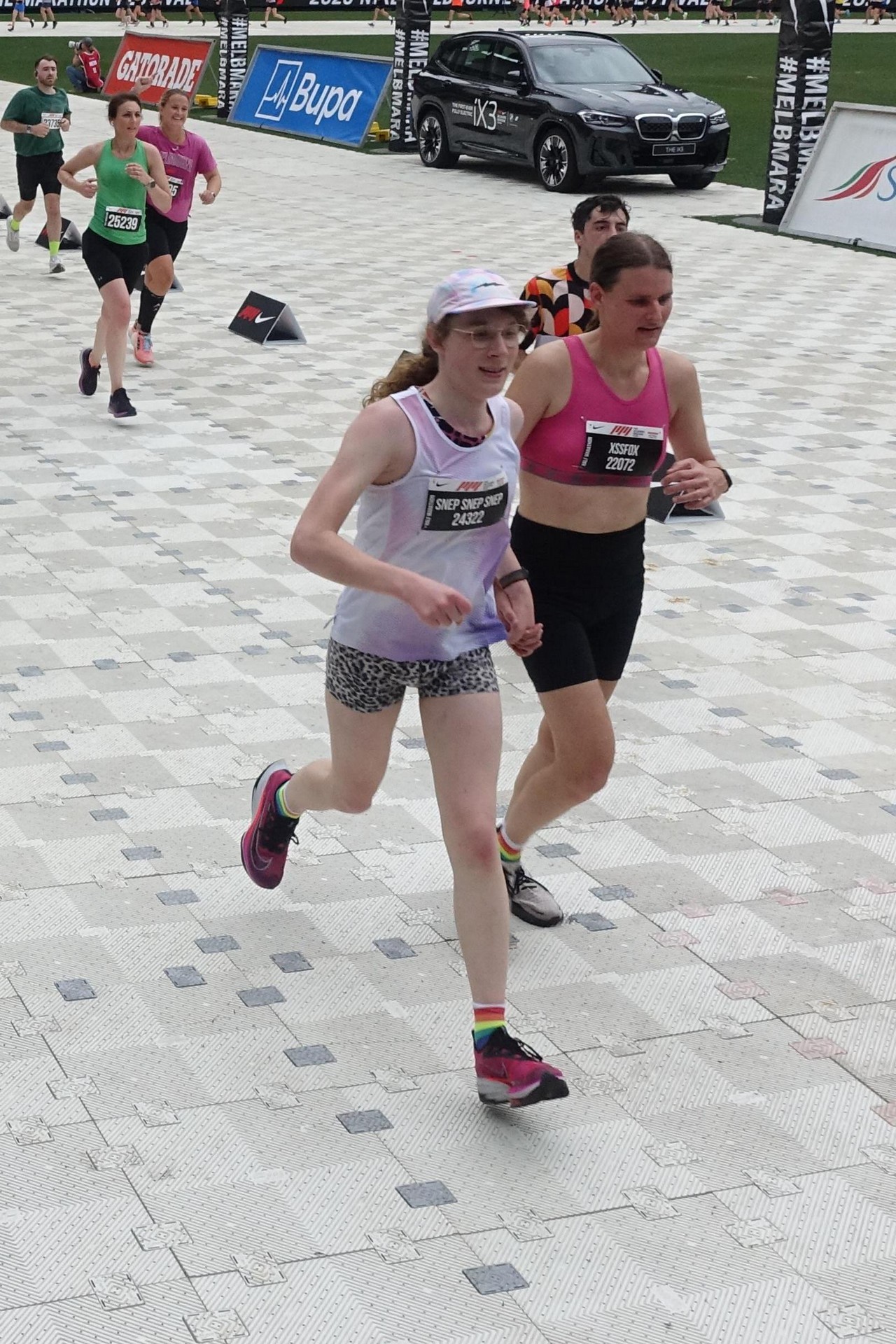 Alex and I crossing the finish line holding hands