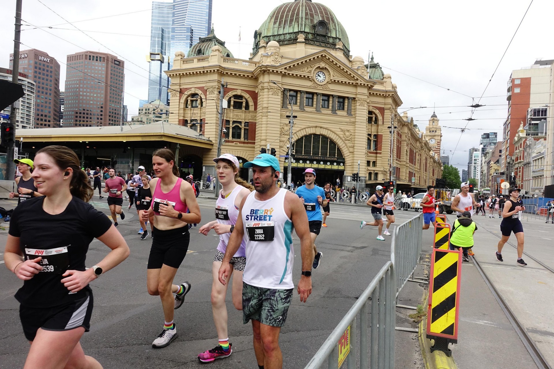 Alex and I running in front of Flinders St station