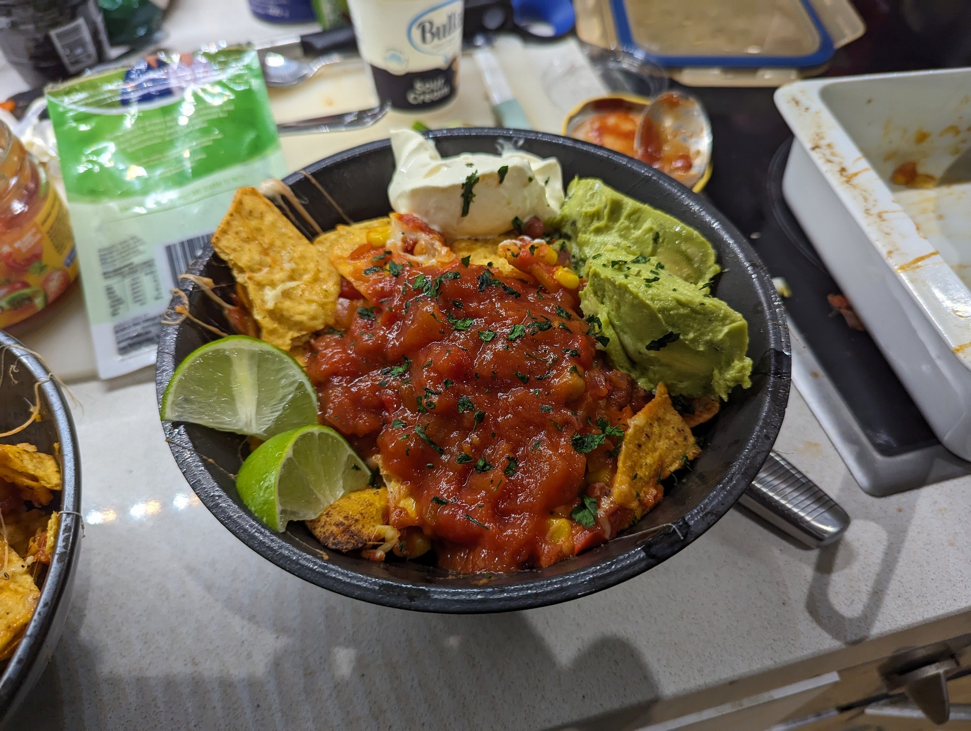 Nacho&rsquo;s with lime, guac and sour cream