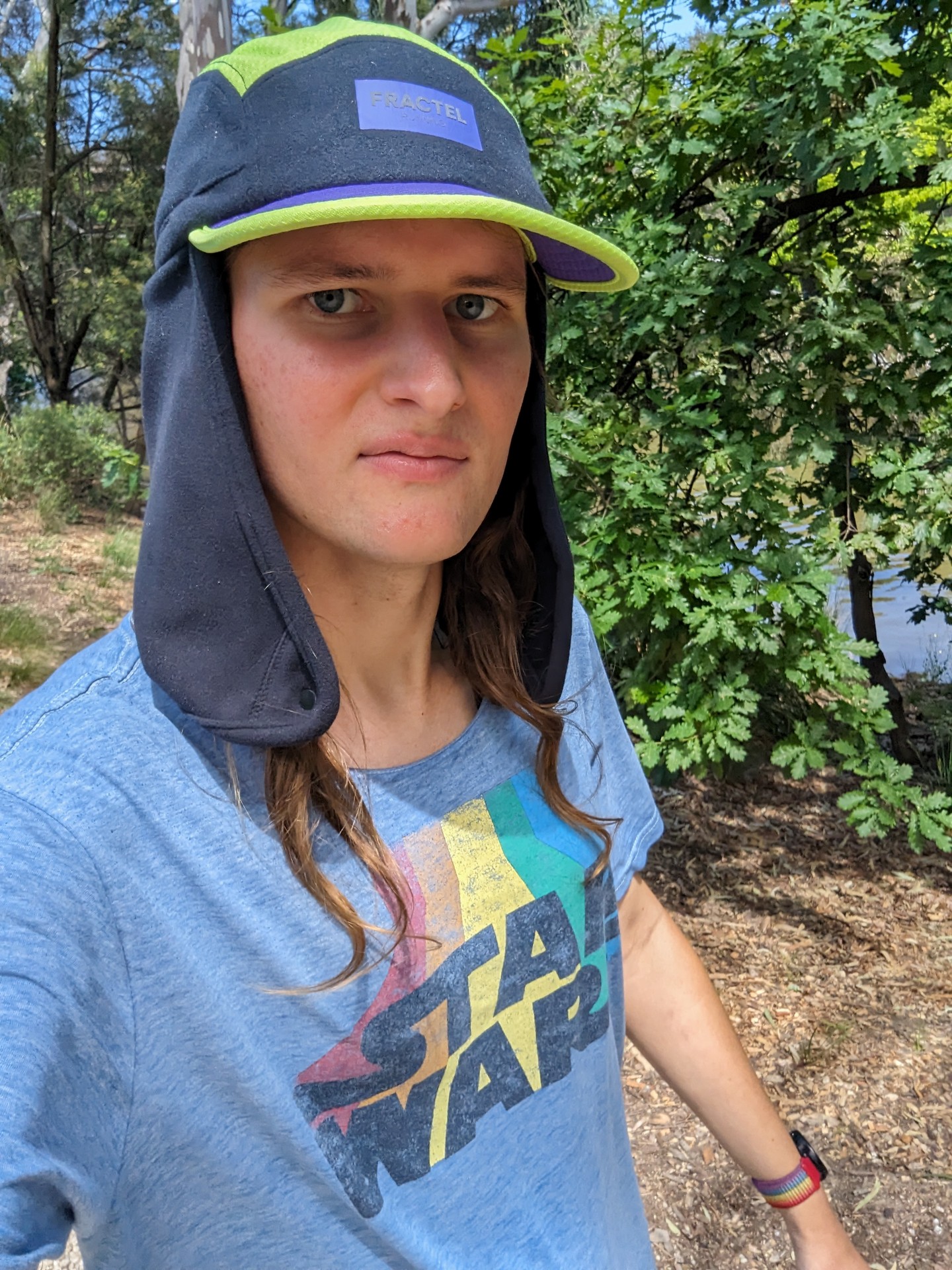 Self of myself wearing a hat while outdoors on a walking track