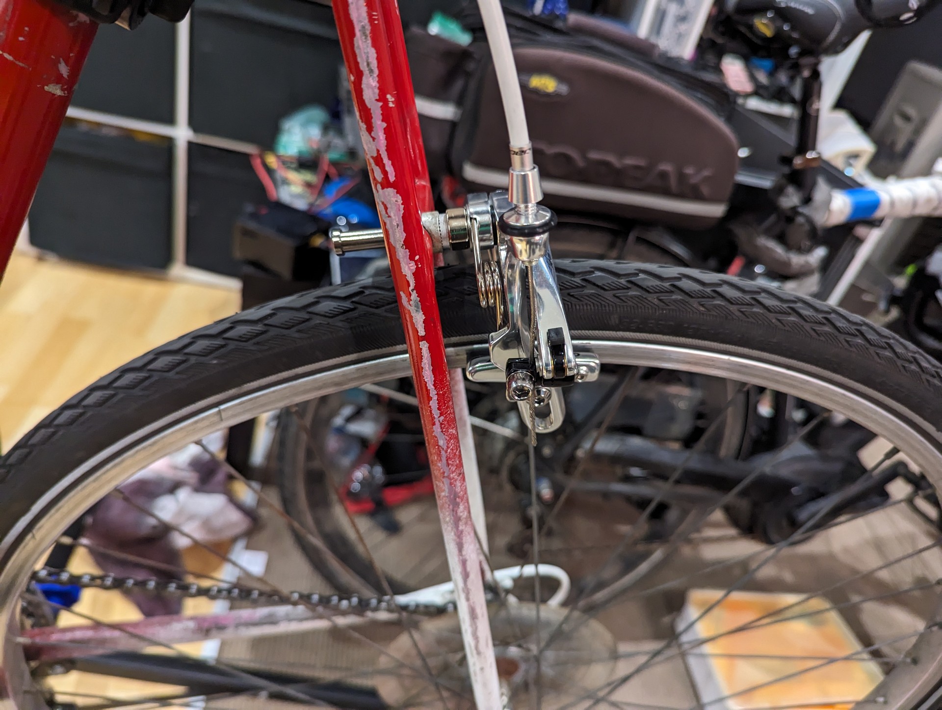 Rear of the bike showing that the front brake has been installed on the rear