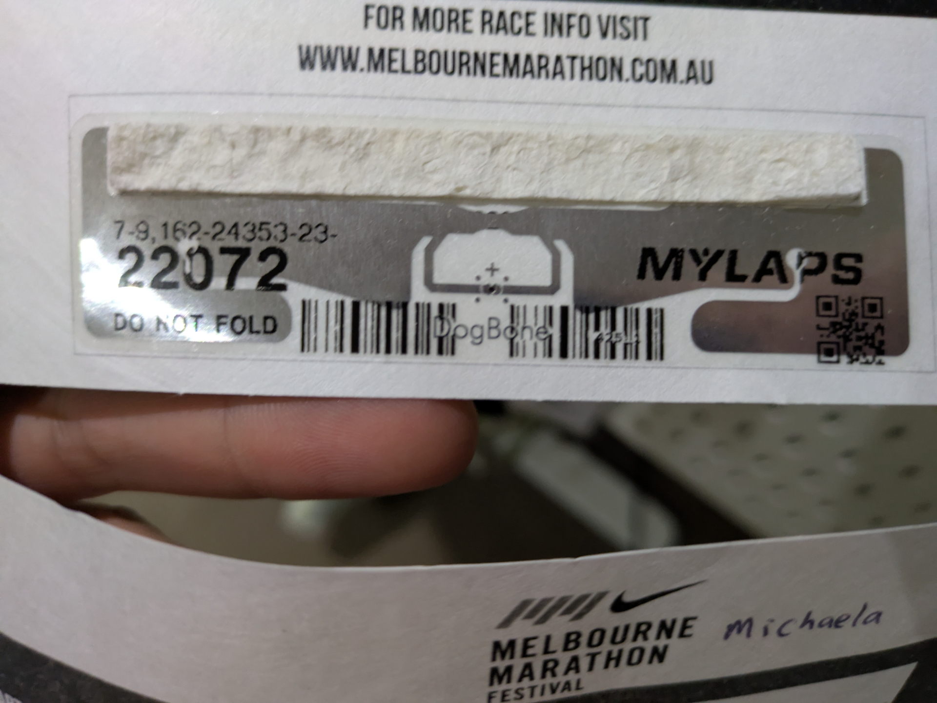 Timing chip on the back of a bib