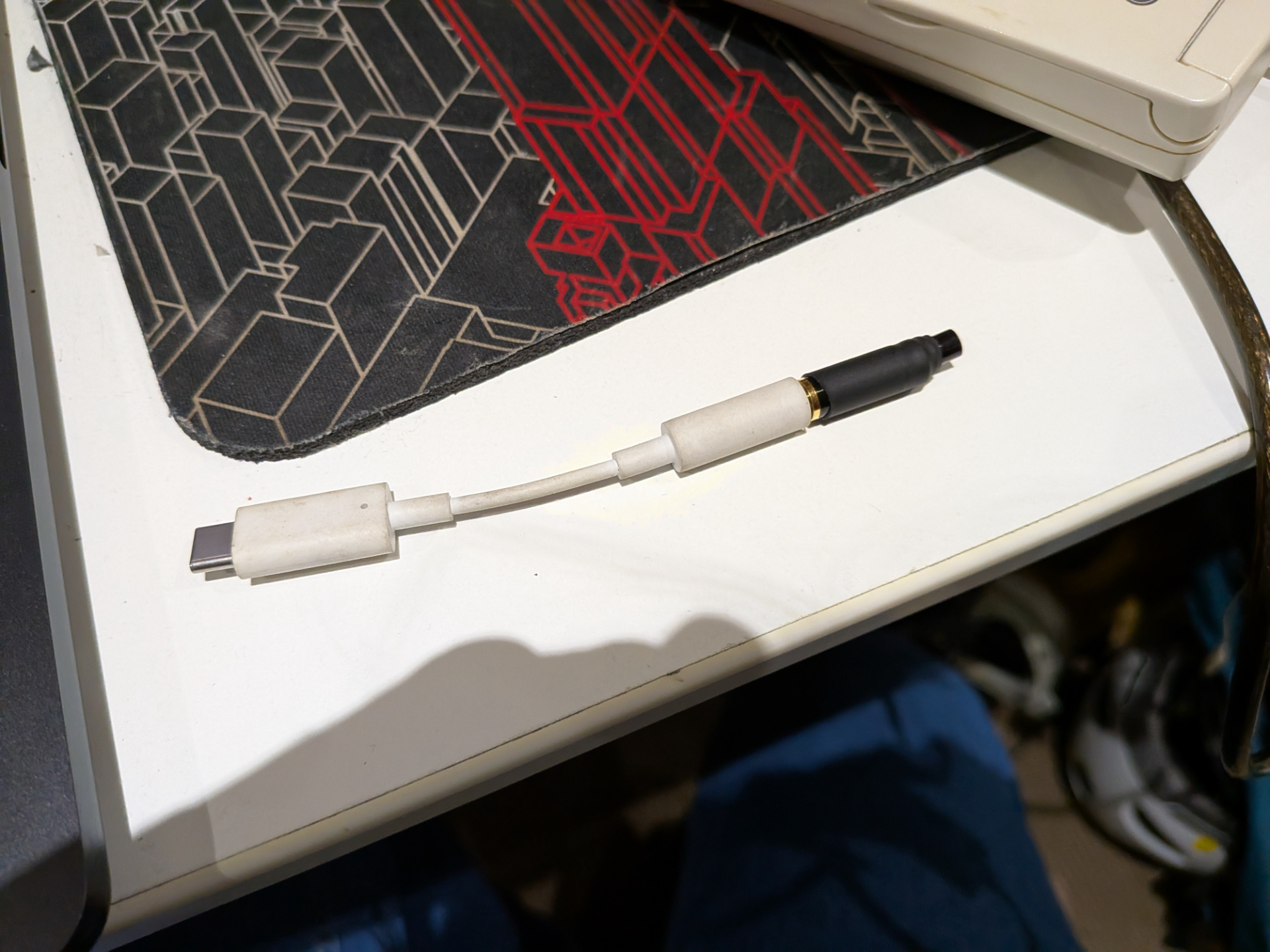 Pixel microphone adapter with a small 3.5mm adapter looking thing which includes a photodiode