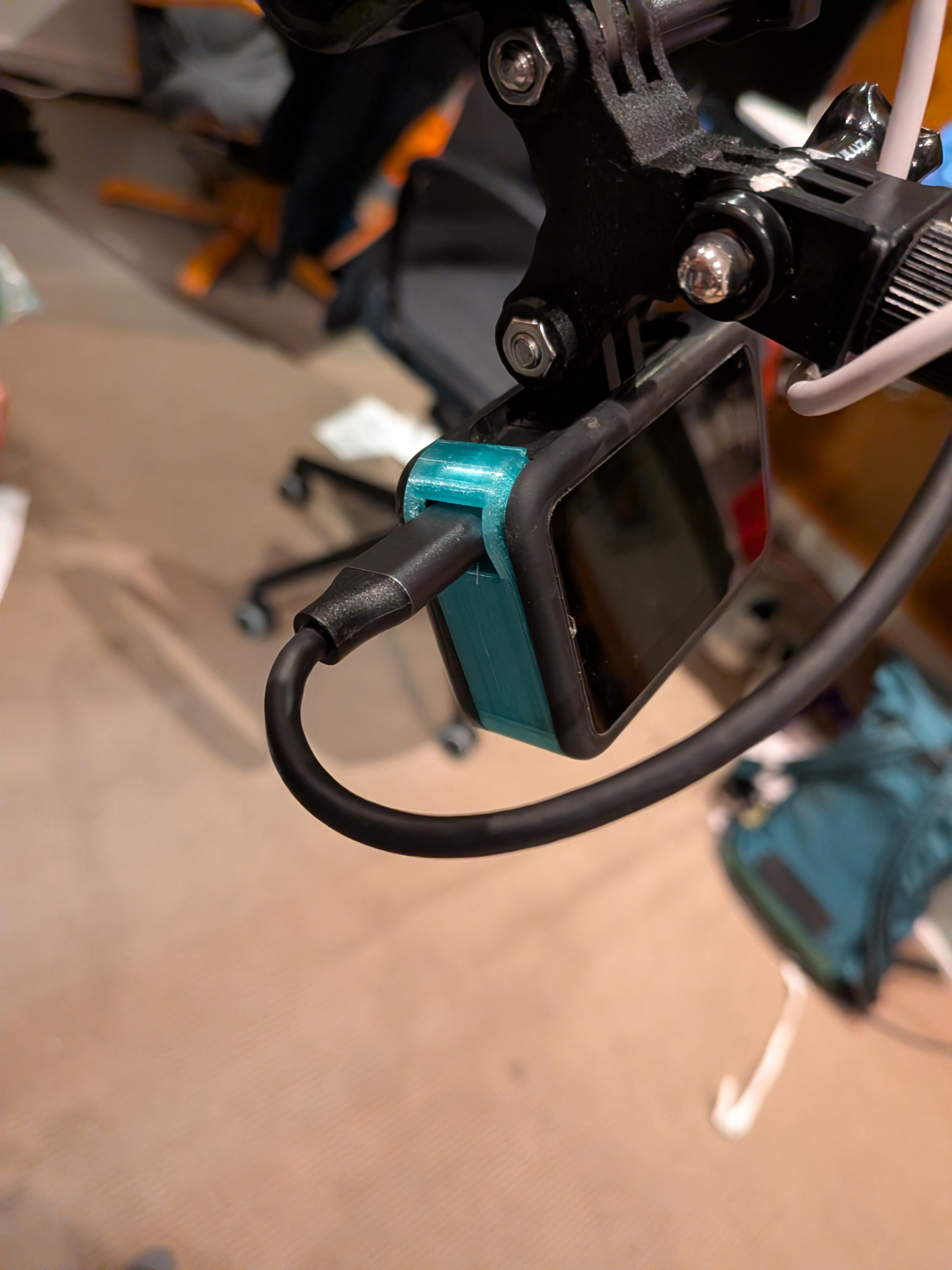 GoPro 3d printed battery cover with USB cable connected