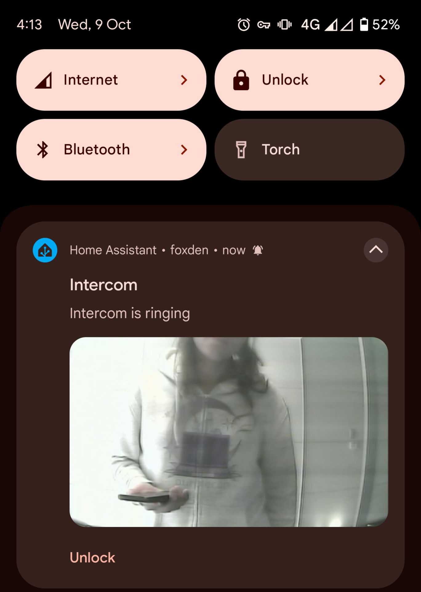 Screenshot of notification from Home Assistant reporting that the intercom is ringing and a button to unlock it